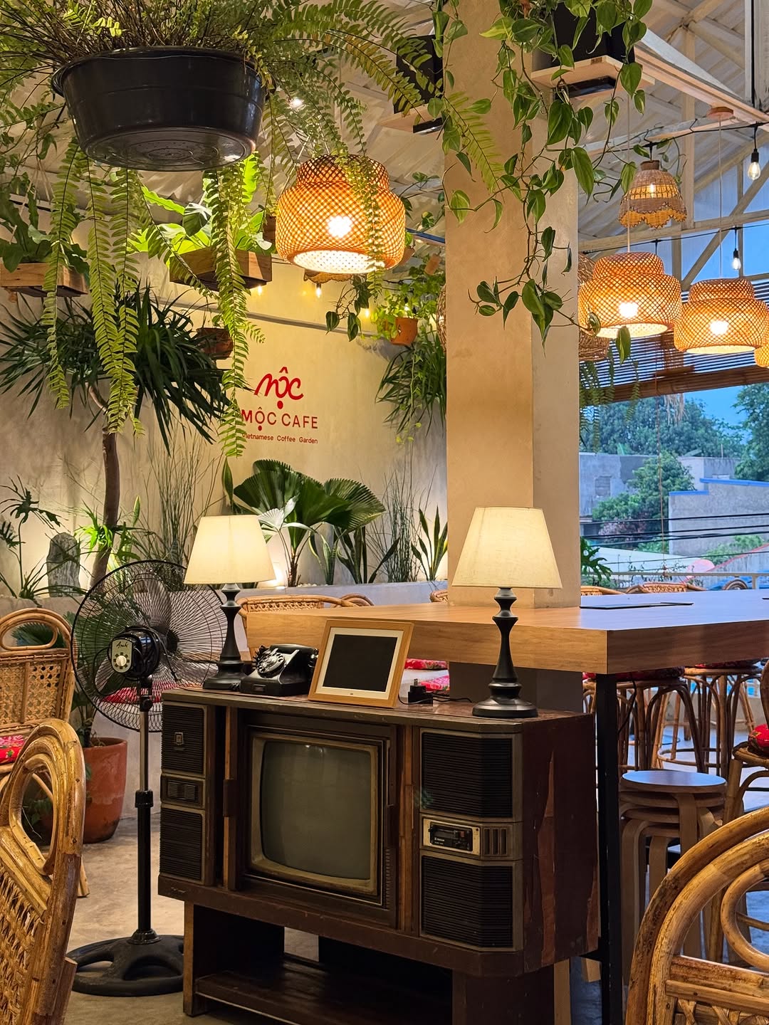 Vintage console and lamps inside MỘC Cafe